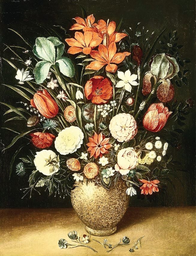 Розы, тюльпаны, гвоздики и другие цветы в вазе на каменном выступе