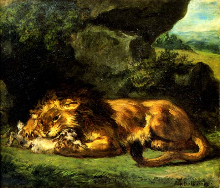 Лев, поедающий кролика